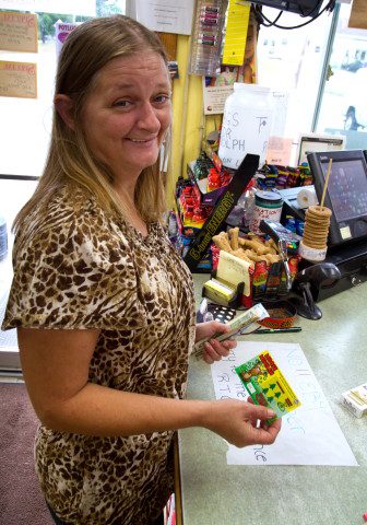 Karen Thayer of Whitefield buying lottery ticket
