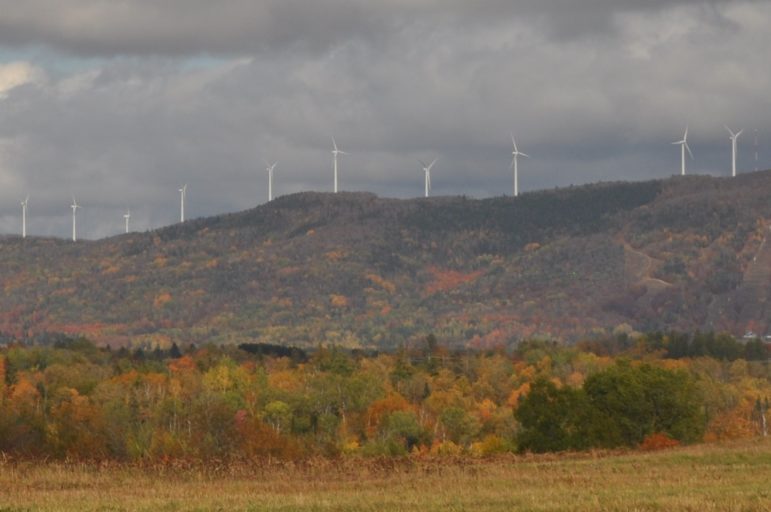 Land-based wind turbines were installed atop Mars Hill in Northern Maine in 2006 and produce a combined 42 megawatts. The state's former planning director expects 2,500 of the 15,000 megawatts of renewable power Maine must add by 2050 to come from land-based wind projects. Photo by Katie Brown.