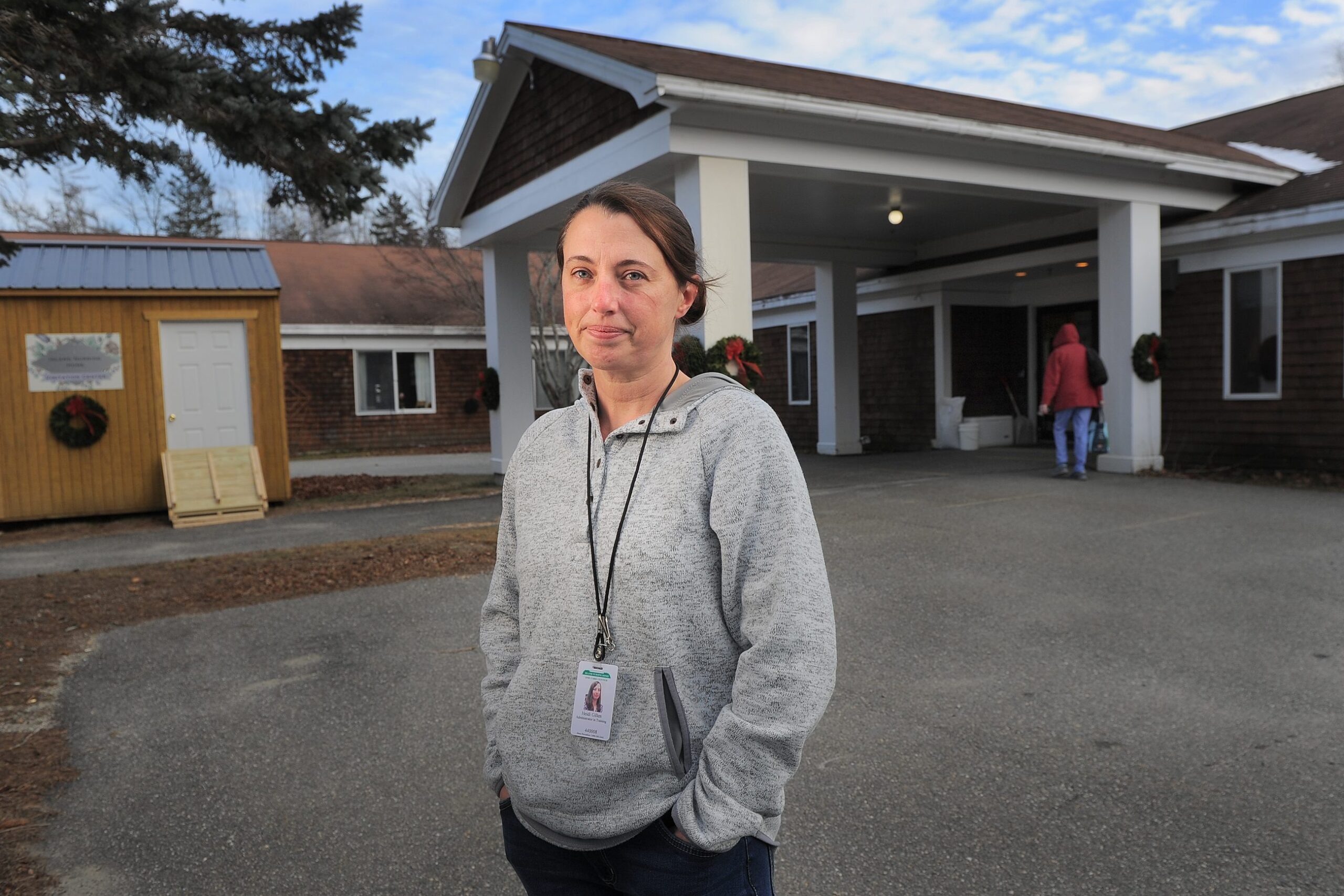 Heidi Gillen standing out the Island Nursing Home on Deer Isle to discuss COVID-19 volunteers