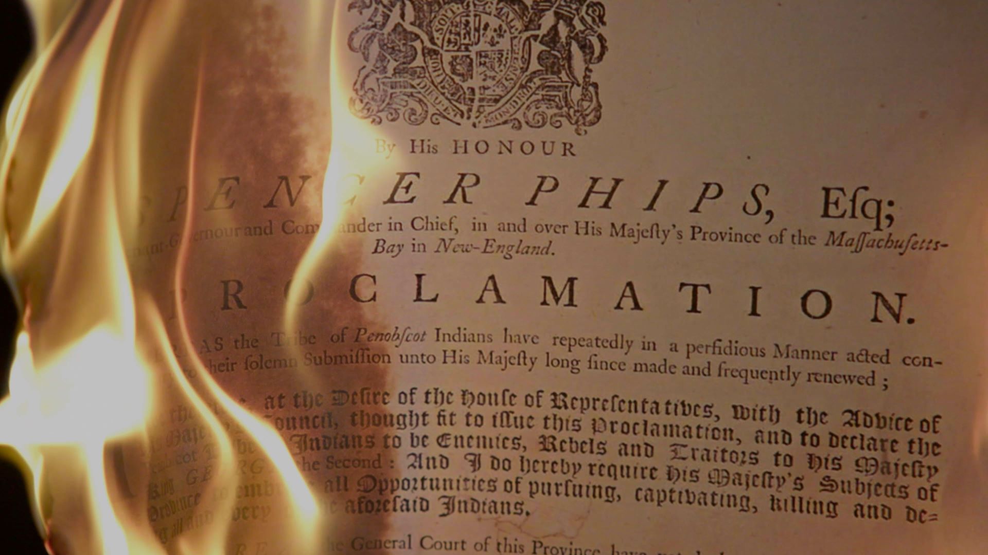 A copy of the Proclamation engulfed in flames. 