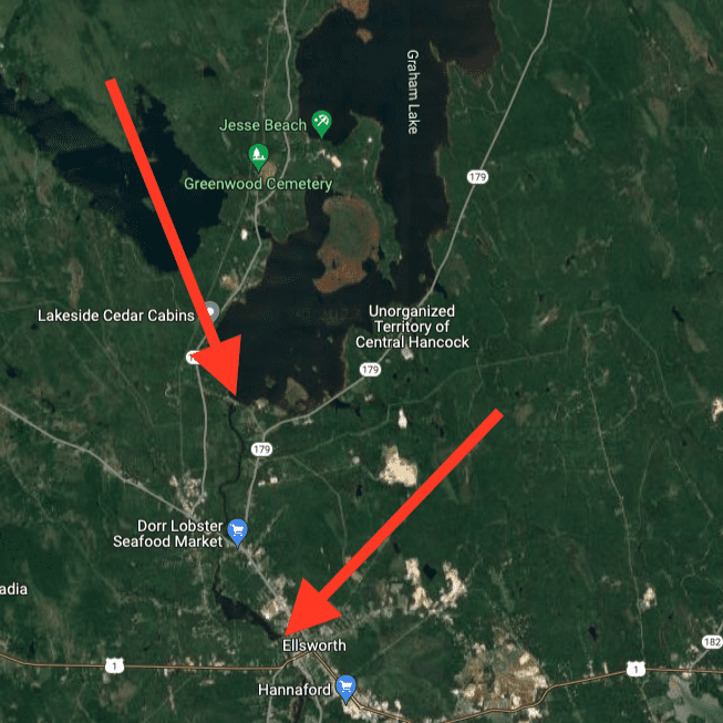 An aerial map of Ellsworth with red arrows pointing to the location of the dams connected to Graham Lake.